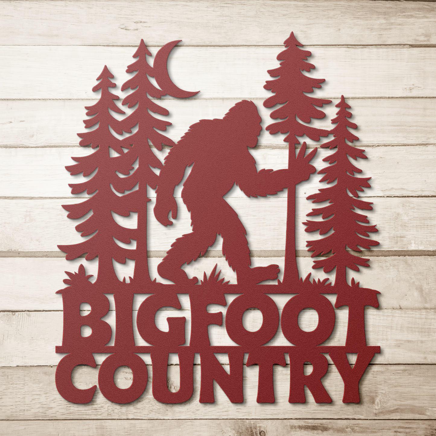 Bigfoot_Country_Metal_Wall_Art_Red_Simple_Wood_BKGD_Mockup.png