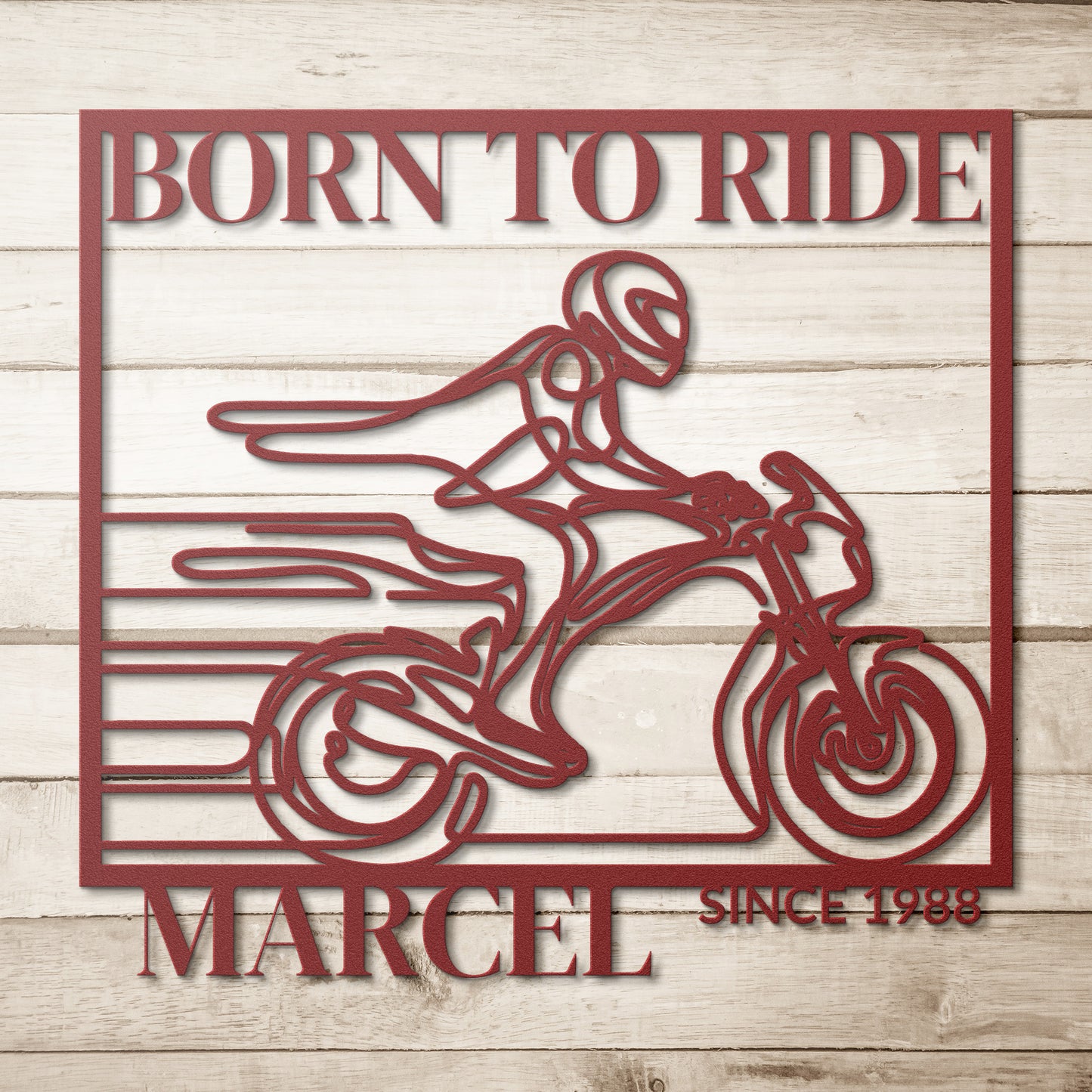 The Biking Metal Line Art, featuring a motorcyclist with the text "Born to Ride Marcel Since 1988," makes for a stunning home decor piece. Crafted from durable 18 gauge steel, this metal sign is built to last.