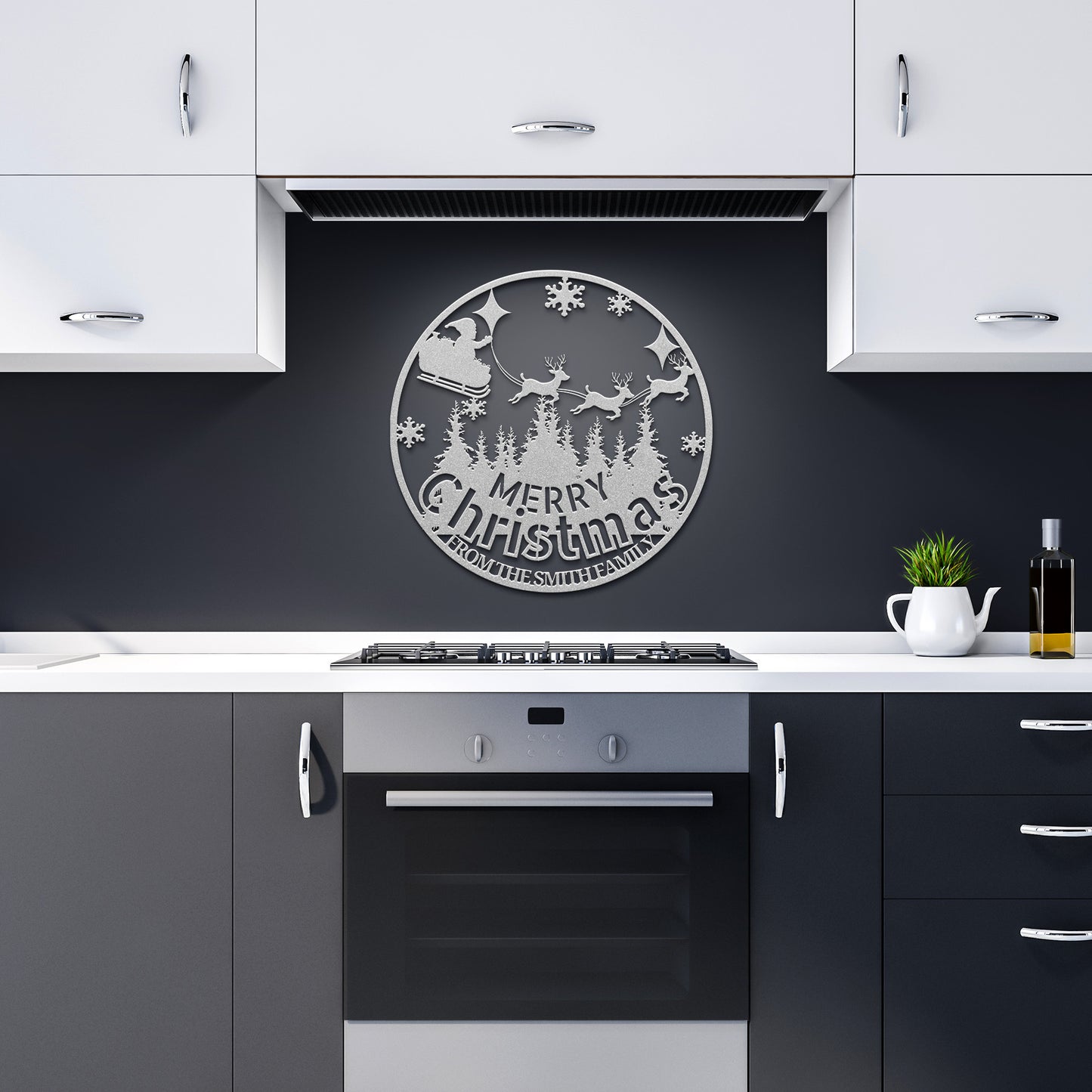 A modern kitchen is beautifully decorated with a "Custom Christmas Metal Sign" crafted from 18-gauge steel, showcasing a Santa and reindeer silhouette above the stove. The scene is completed with white upper cabinets, dark lower cabinets, a potted plant, and an oil bottle for a festive home decor touch.