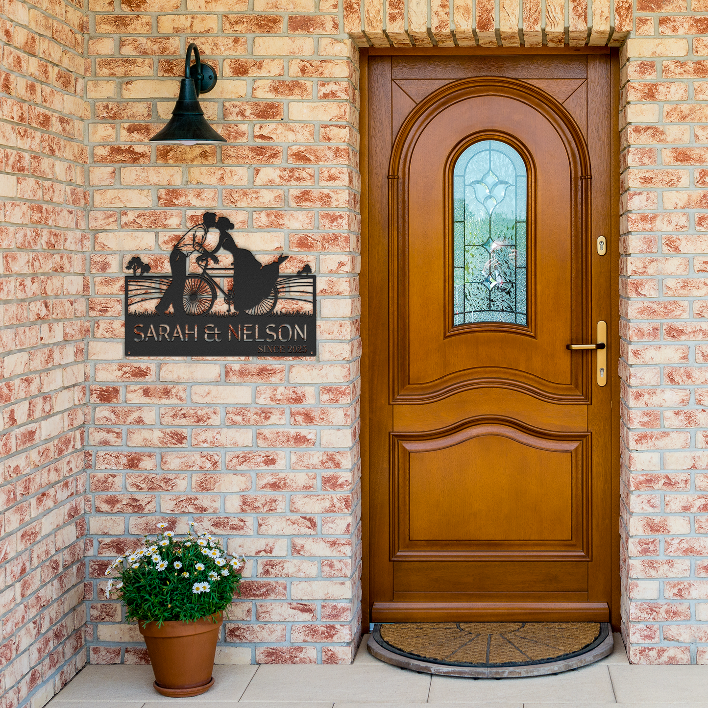 Cycling_Couple_Kissing_Metal_Sign_Black_Brick_Entrance_Mockup.png