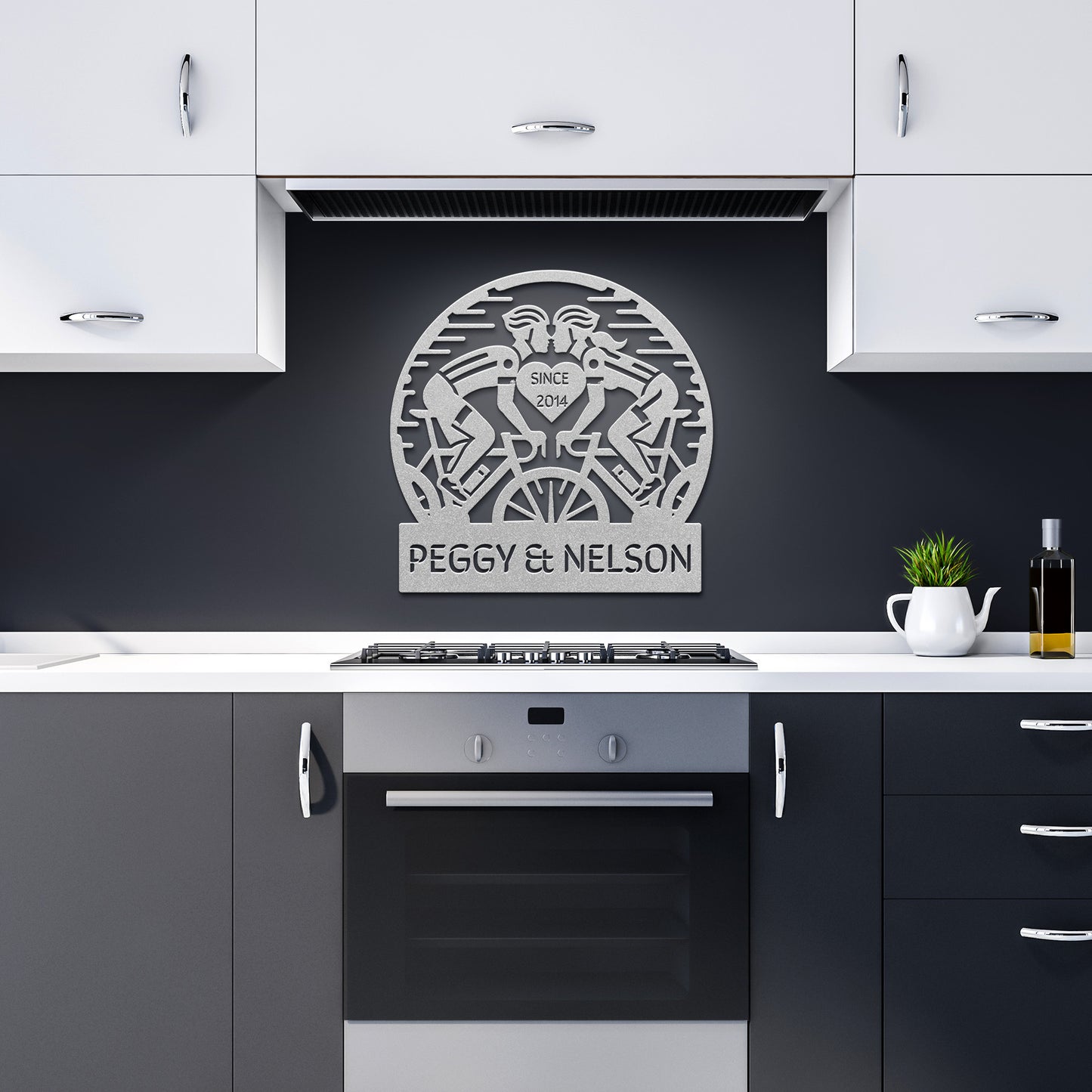 The "Cycling Couple Metal Sign" crafted from 18-gauge steel features "Peggy & Nelson" with bicycle riders, adding charm to the kitchen and beautifully complementing the cabinets and stove.