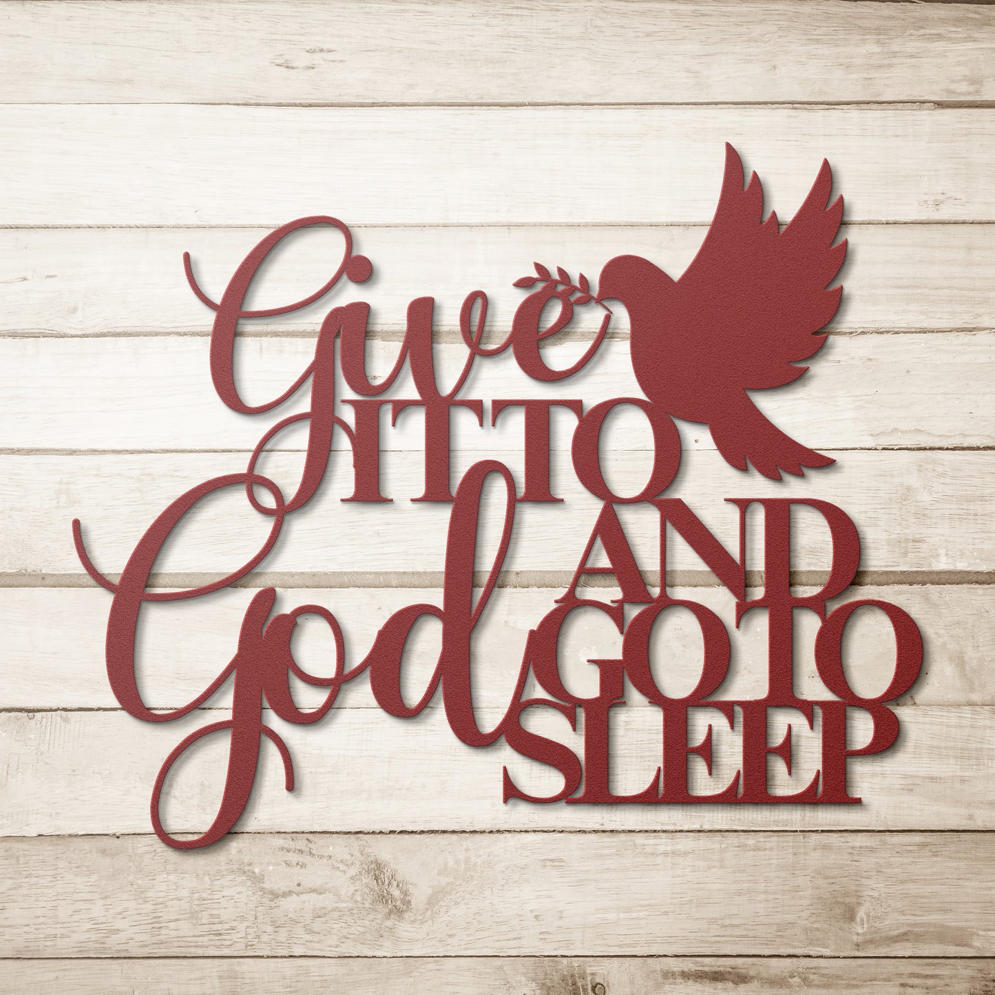 This Christian bedroom wall art features the inspirational saying "Give it to God and go to sleep," with a silhouette of a dove holding an olive branch, all in red lettering on a wooden background as depicted in the Give It To God And Go To Sleep Christian Metal Sign.