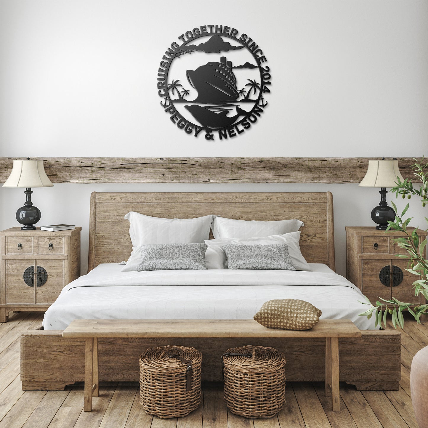 In a rustic bedroom, a wooden bed and two side tables are elegantly complemented by the Personalized Cruise Couples Metal Wall Art. This powder-coated metal sign features a cruise ship silhouette with the text "Cruising Together Since 2014, Peggy & Nelson," adding charm to the cozy home decor.