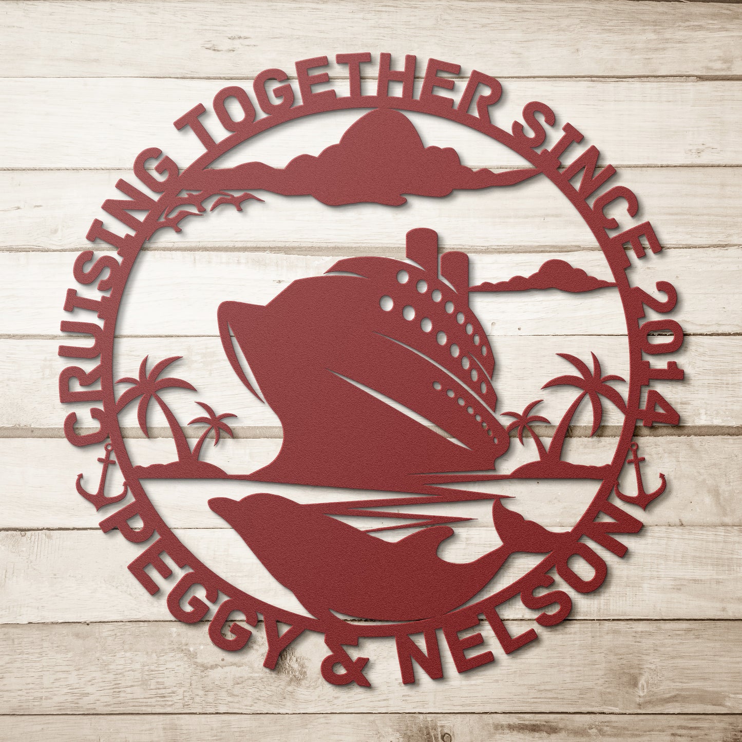 The Personalized Cruise Couples Metal Wall Art is expertly crafted from 18 gauge steel, showcasing a cruise ship and dolphin surrounded by palm trees and clouds, with the text "Cruising Together Since 2014 Peggy & Nelson" elegantly displayed on its wooden background, making it an ideal home decor piece.
