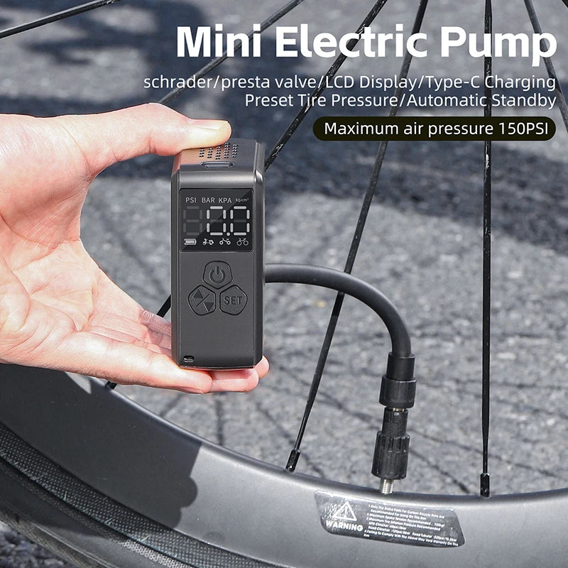 A WEST BIKING Bike Pump Portable Mini Electric Air Pump displayed with its lcd screen showing 150 psi, compatible with various valve types and Type-C charging.