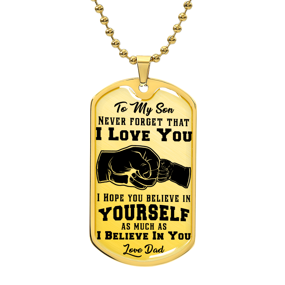 The "To My Son, Never Forget That I Love You - Dog Tag & Ball Chain" features an 18k gold finish with a meaningful message from Dad. It includes a fist bump design and is perfect for custom engraving to add a personal touch.