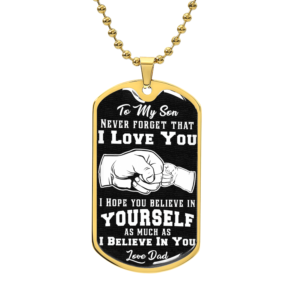 The "To My Son, Believe In Yourself" Dog Tag & Ball Chain is crafted from high-quality surgical steel. It features a personalized message from a father to his son with an illustration of a fist bump and offers custom engraving for added sentiment.