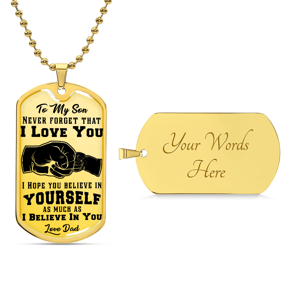 The "To My Son, Never Forget That I Love You - Dog Tag & Ball Chain" features a fist bump design and reads: "I hope you believe in yourself as much as I believe in you. Love, Dad." With an 18k gold finish, the back is blank for custom engraving to create cherished personalized jewelry.