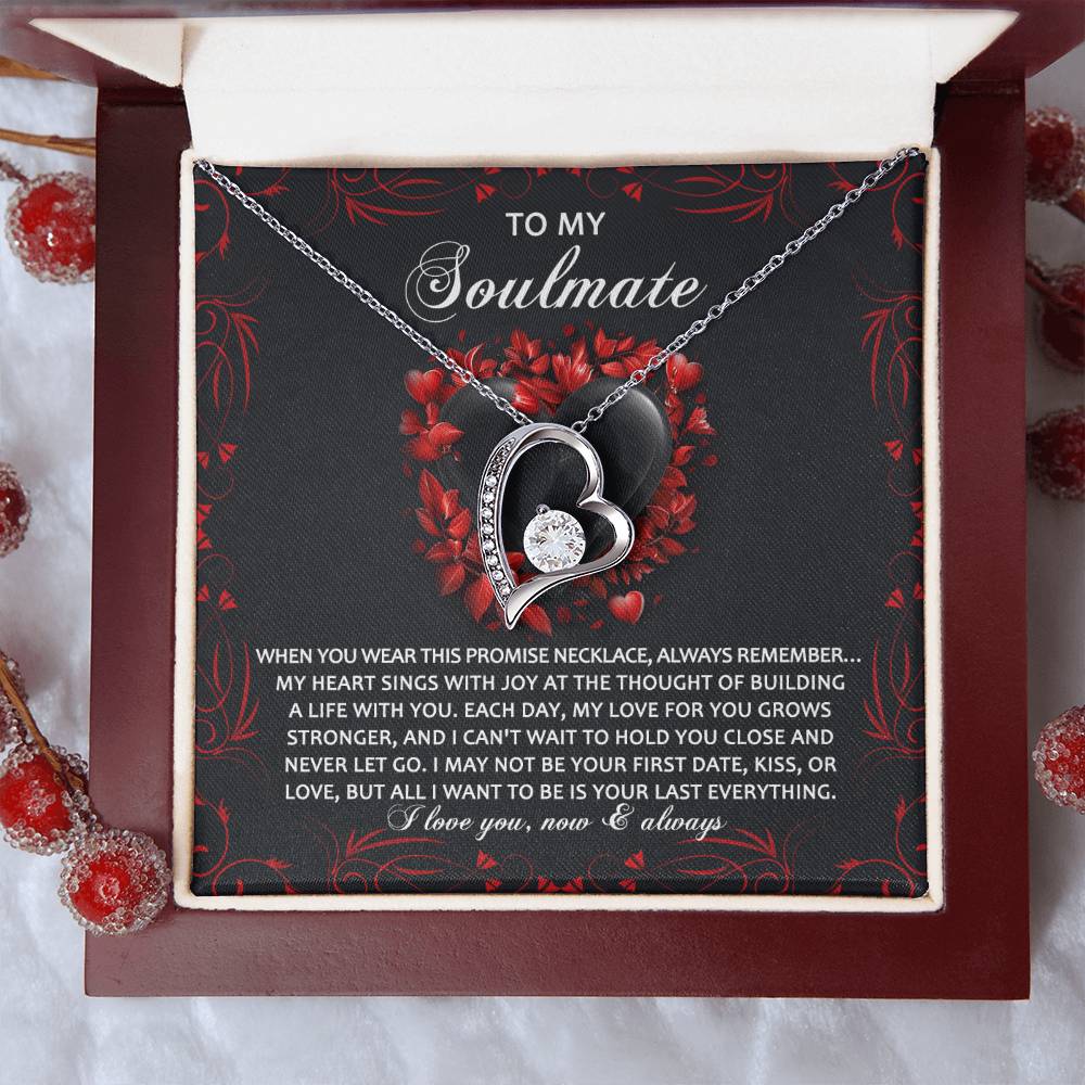 The Soulmate-Hold You Close - Forever Love Necklace features a gold heart-shaped pendant with a cubic zirconia crystal, displayed in an open box. The background reads "To My Soulmate" with a heartfelt message about love and promise.