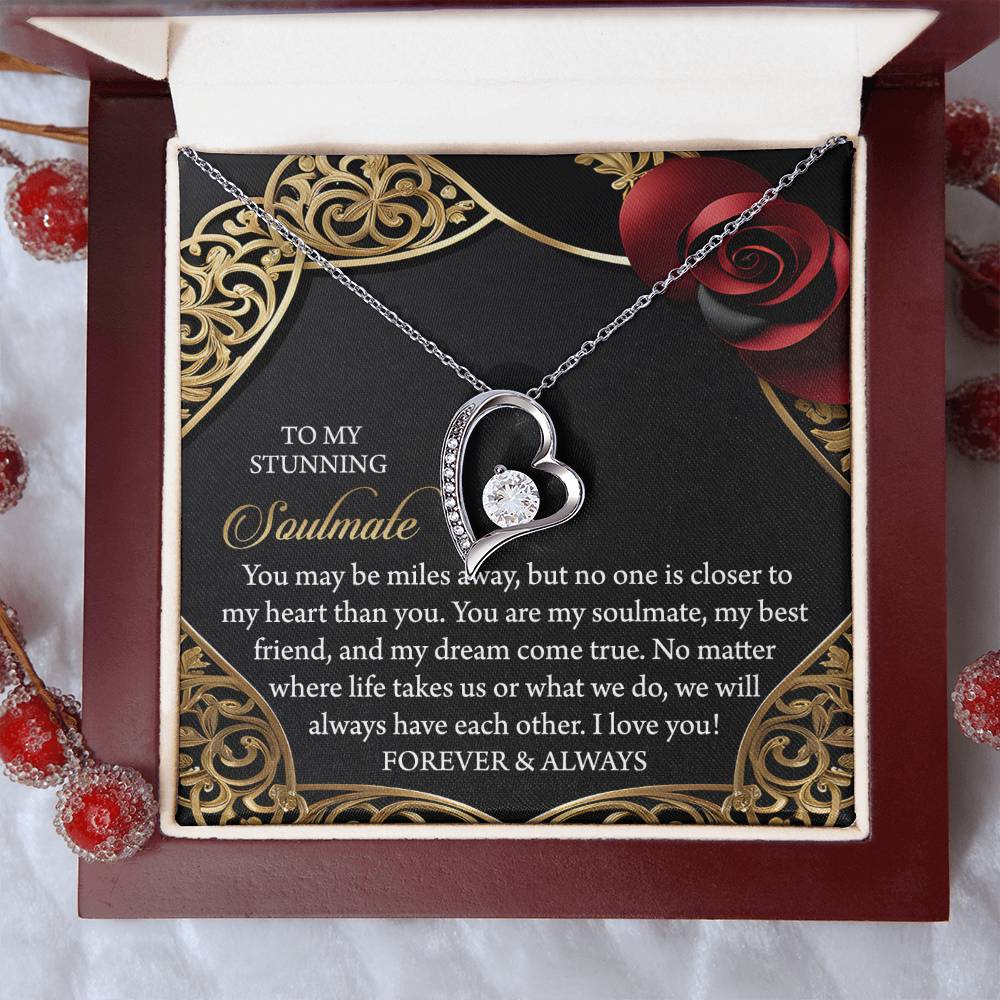 The Soulmate-Have Each Other - Forever Love Necklace, beautifully boxed, showcases a gold-finished heart with sparkling cubic zirconia. Accompanied by a rose-adorned card with a romantic message, it's the ideal token of everlasting love.
