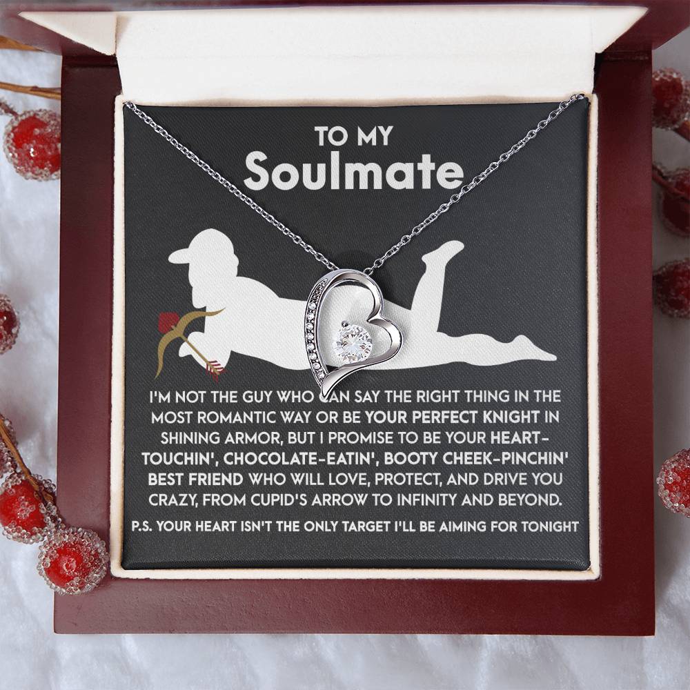 The Soulmate-Cupid's Arrow - Forever Love Necklace, a silver heart-shaped pendant with diamond accents and a white gold finish, is displayed in an open box alongside a playful romantic message for your soulmate.