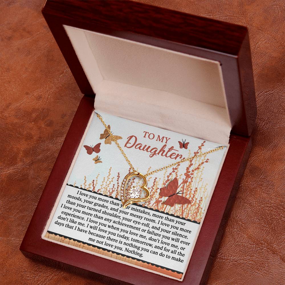 The Daughter-Love You More - Forever Love Necklace, presented in a wooden box with a "To My Daughter" message card and adorned with CZ crystals and butterflies, conveys a heartfelt message.