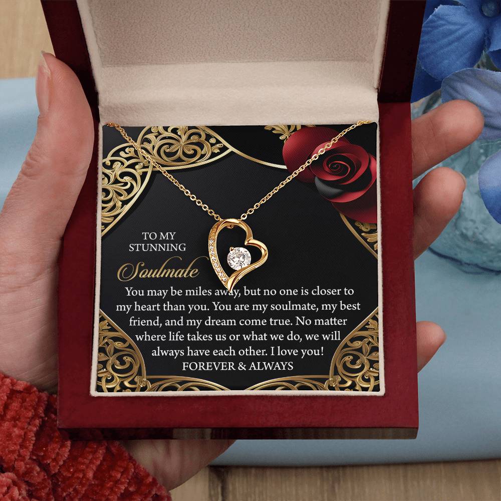 The Soulmate-Have Each Other - Forever Love Necklace features intertwined hearts with a sparkling cubic zirconia and comes in a box with a romantic message for your soulmate.
