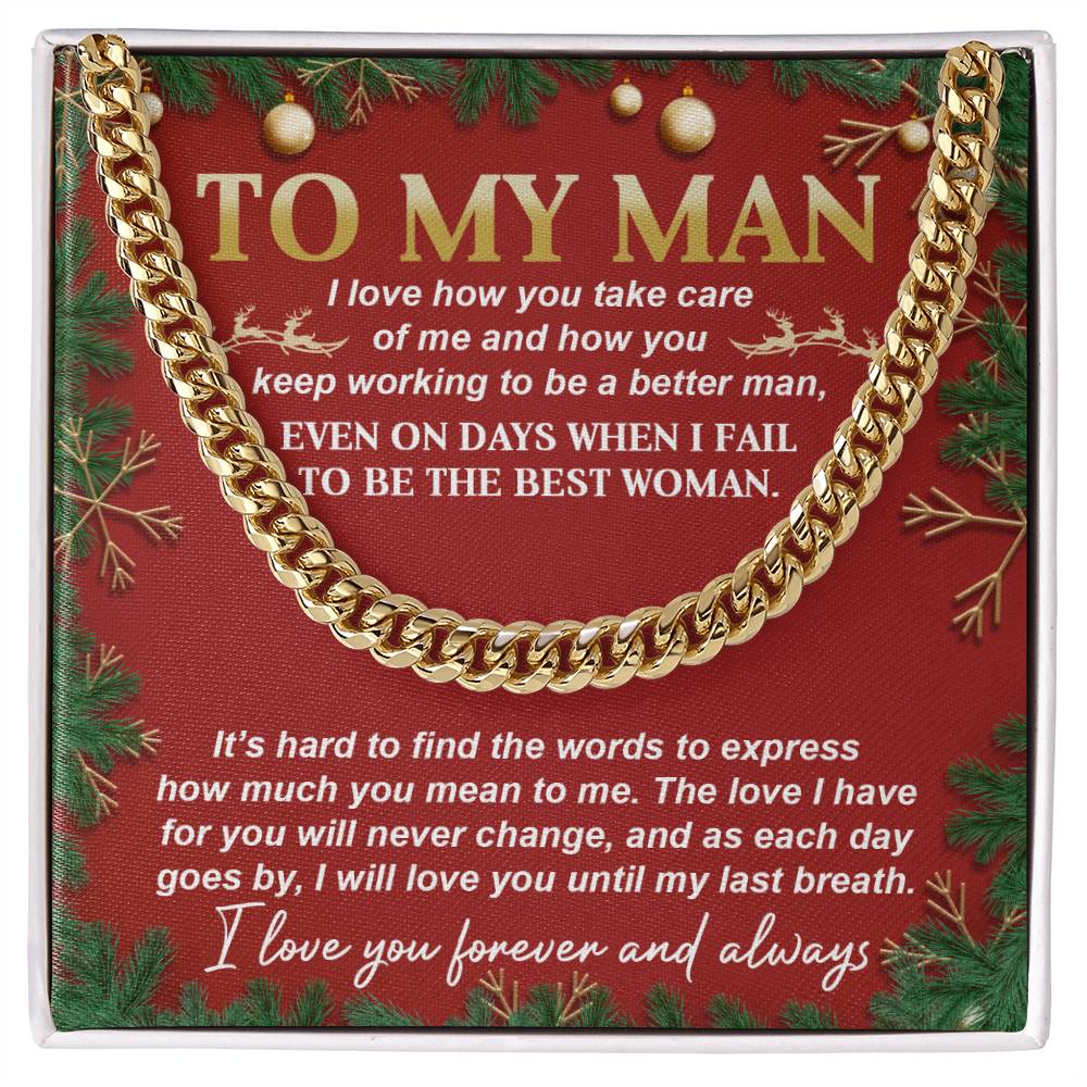 The My Man-Never Change - Cuban Link Chain rests on a vibrant red background, intertwined with green pine branches and accompanied by a heartfelt message to your partner. This elegant piece speaks volumes and adds a timeless touch to any personal sentiment.
