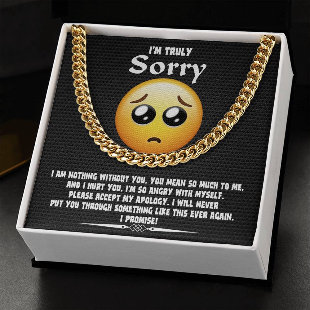 A Sorry-Accept My Apology Cuban Link Chain draped over a note featuring a sad emoji and an apology message, expressing regret and a promise never to repeat the mistake.