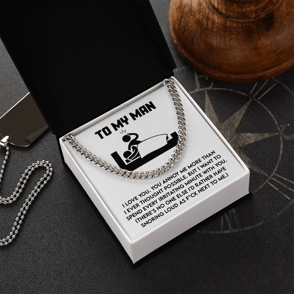 The My Man-Next To Me Cuban Link Chain, crafted from polished stainless steel for a perfect shine, comes in an open black box with the playful "To My Man" message and a couple-in-bed drawing celebrating love and snoring.