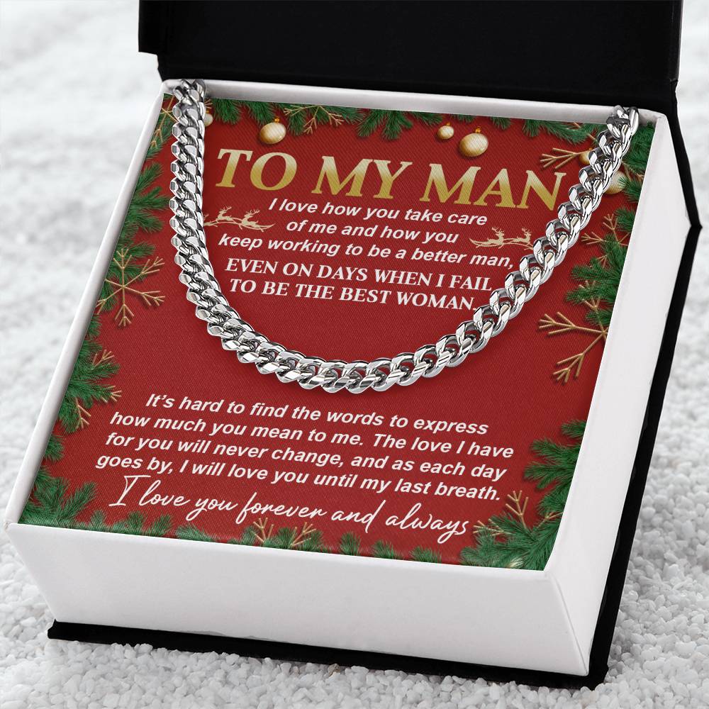The "My Man-Never Change - Cuban Link Chain" arrives elegantly nestled in a box, accompanied by a heartfelt message of love and gratitude for your partner. Set against a red background adorned with holiday decorations, this gift is perfect for the season.