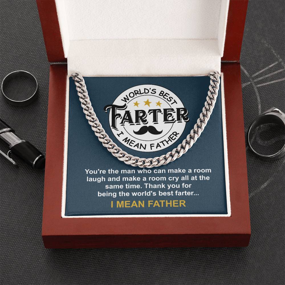 The "To Dad, World's Best Farter" Cuban Link Chain in an open red box boasts a humorous award-like message, with rings and a pen enhancing the personalized necklace gift experience.