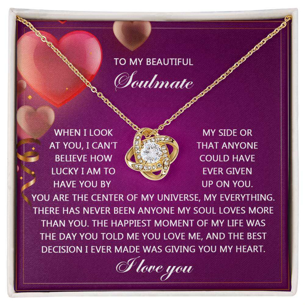The Soulmate-My Soul - Love Knot Necklace, embellished with sparkling cubic zirconia stones, is presented on a card with a romantic message and heart graphics—a truly personalized gift.