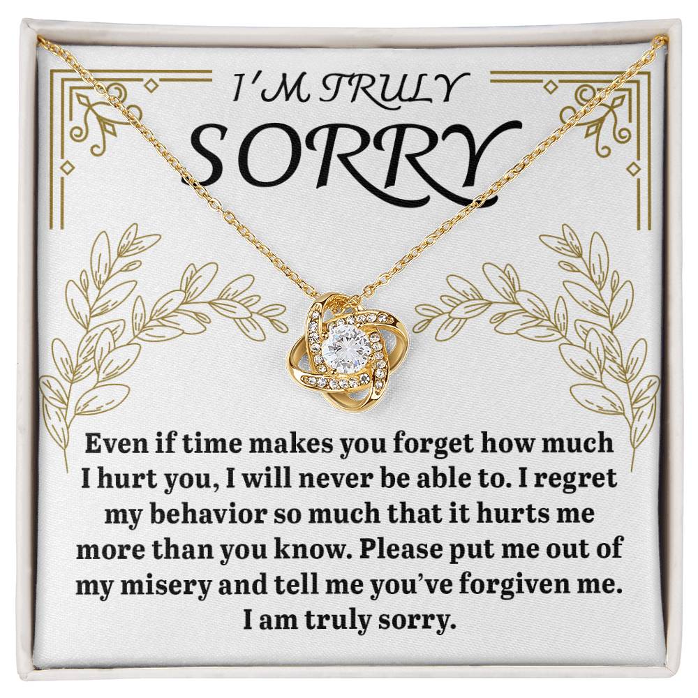 The Sorry-It Hurts Me - Love Knot Necklace features a stunning diamond pendant and is elegantly showcased on a heartfelt card that reads: "I'm truly sorry. Even if time makes you forget how much I hurt you, I will never be able to. I regret my behavior." Carefully crafted from 14k white gold and embellished with cubic zirconia crystals, this necklace symbolizes our unbreakable bond.