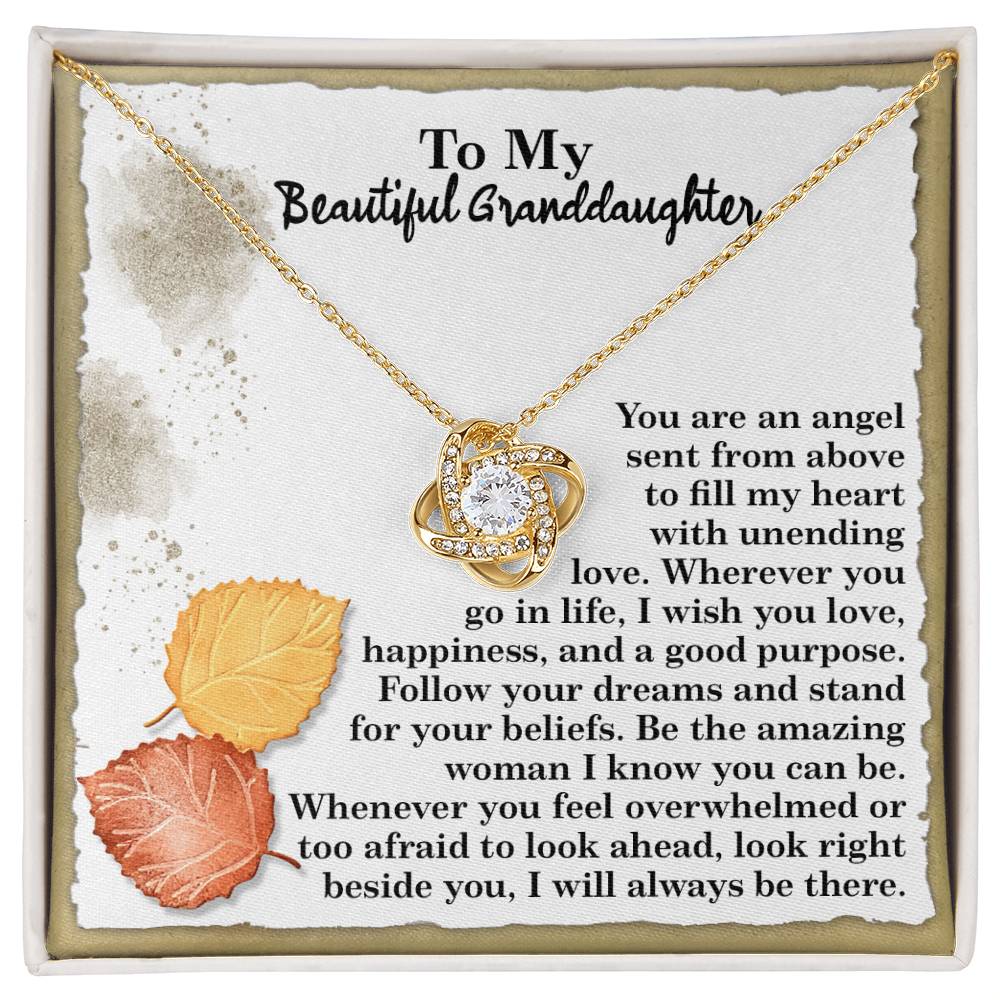 The Granddaughter-An Angel - Love Knot Necklace features stunning cubic zirconia crystals and comes packaged in a box. A touching message for a granddaughter conveys love, support, and encouragement, with leaves beautifully adorning the corners of the personalized gift box.