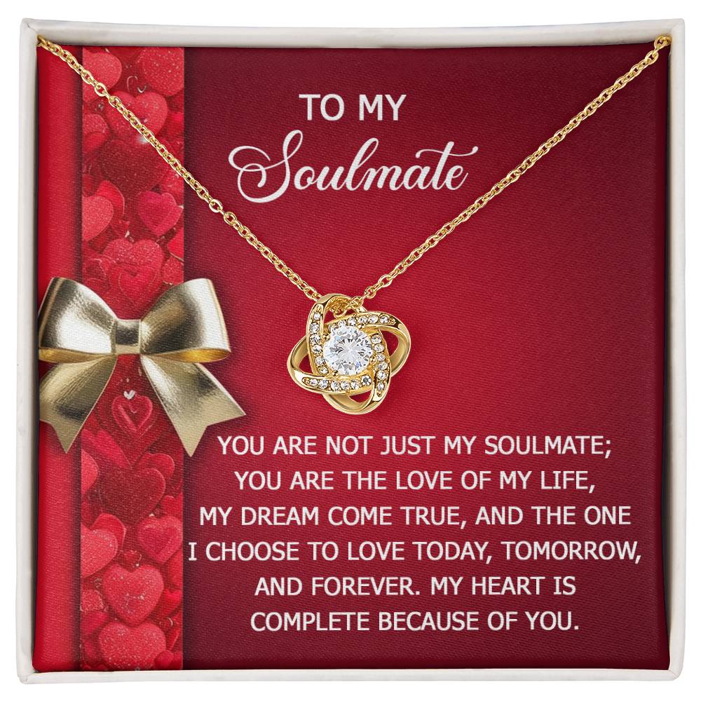 The Soulmate-Because Of You - Love Knot Necklace, made of 14k white gold with an interlocking design and a central cubic zirconia crystal, is beautifully presented on a red gift card featuring the romantic message titled "To My Soulmate.