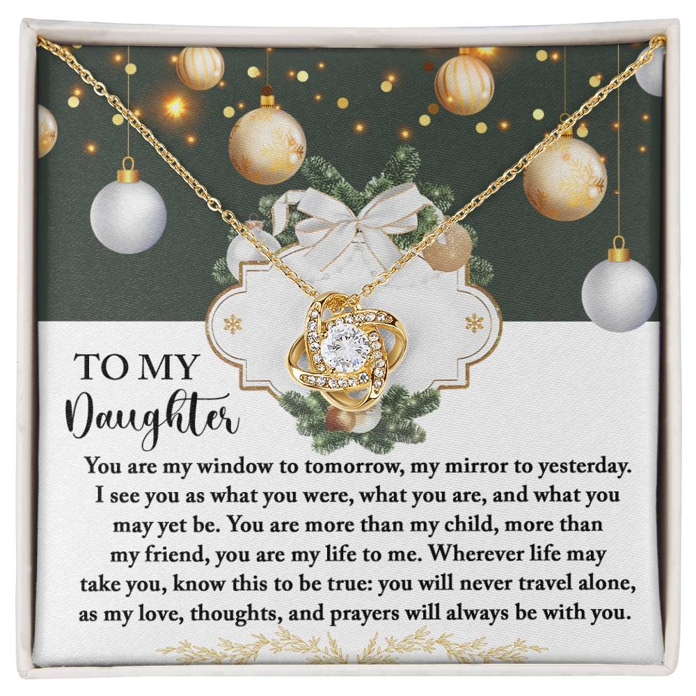 The Daughter-My Mirror - Love Knot Necklace, adorned with a central gem and shimmering cubic zirconia crystals, is elegantly presented in a gift box inscribed with "To My Daughter," accompanied by a heartfelt message, making it the perfect personalized gift.