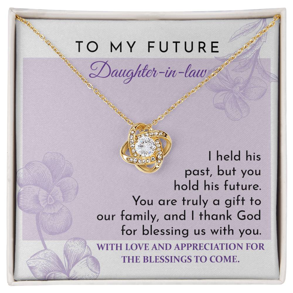 To Daughter-in-law, A Gift - Love Knot Necklace with an intertwined pendant, set against a card reading "To My Future Daughter-in-law," and an appreciation message expressing gratitude and blessings for the future. Decorated with shimmering cubic zirconia, this piece is a glowing testament to your welcome into the family.