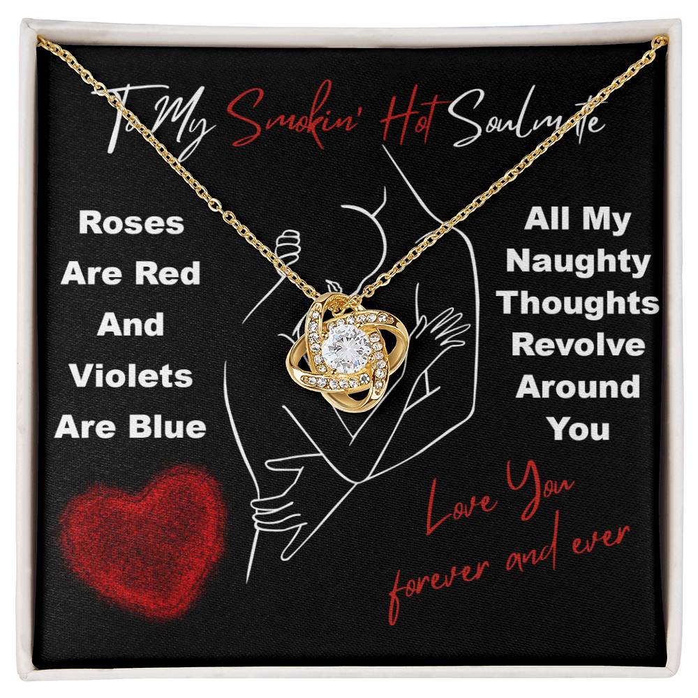 The Soulmate-Around You - Love Knot Necklace is beautifully presented on a black card with a romantic poem, an embracing couple sketch, and heart design in white and red text, making it an ideal personalized gift for your loved one.
