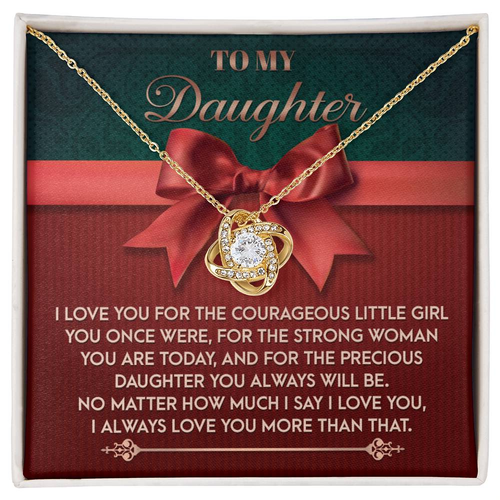 The Daughter-Always Will Be - Love Knot Necklace features a heart pendant, tastefully presented on a card with an affectionate message for your daughter. Choose from a white gold or yellow gold finish, embellished with sparkling cubic zirconia crystals, and beautifully accented by a red bow and an endearing note.