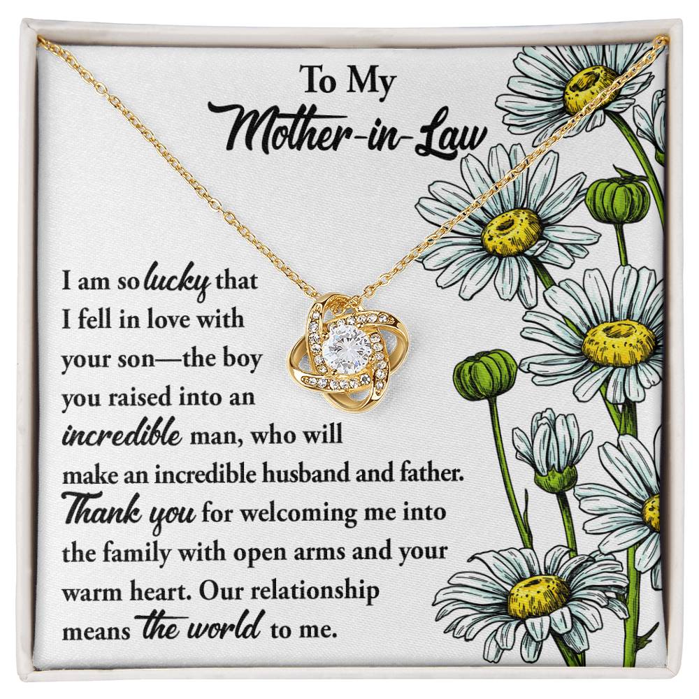 To Mother-In-Law, Warm Heart - Love Knot Necklace on a floral card with a heartfelt message to a mother-in-law, expressing gratitude and affection.