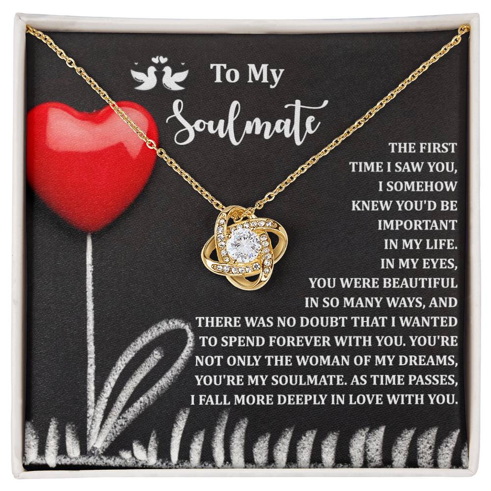 The Soulmate-Forever With You - Love Knot Necklace features a central gem and cubic zirconia crystals, elegantly presented on a "To My Soulmate" card with white gold accents. A red heart and romantic text complete this enchanting piece.