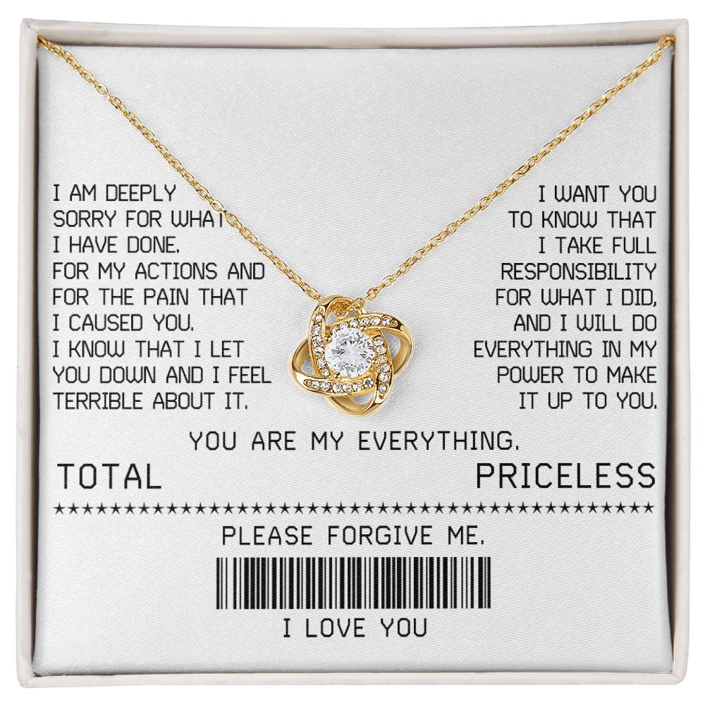 The Sorry-Make It Up - Love Knot Necklace, featuring a white gold finish and adorned with shimmering cubic zirconia crystals, is beautifully presented on a card with an apology message. This card includes phrases such as "TOTAL PRICELESS," "PLEASE FORGIVE ME," and "I LOVE YOU," along with a barcode, making it the perfect elegant touch for your sincere apology.