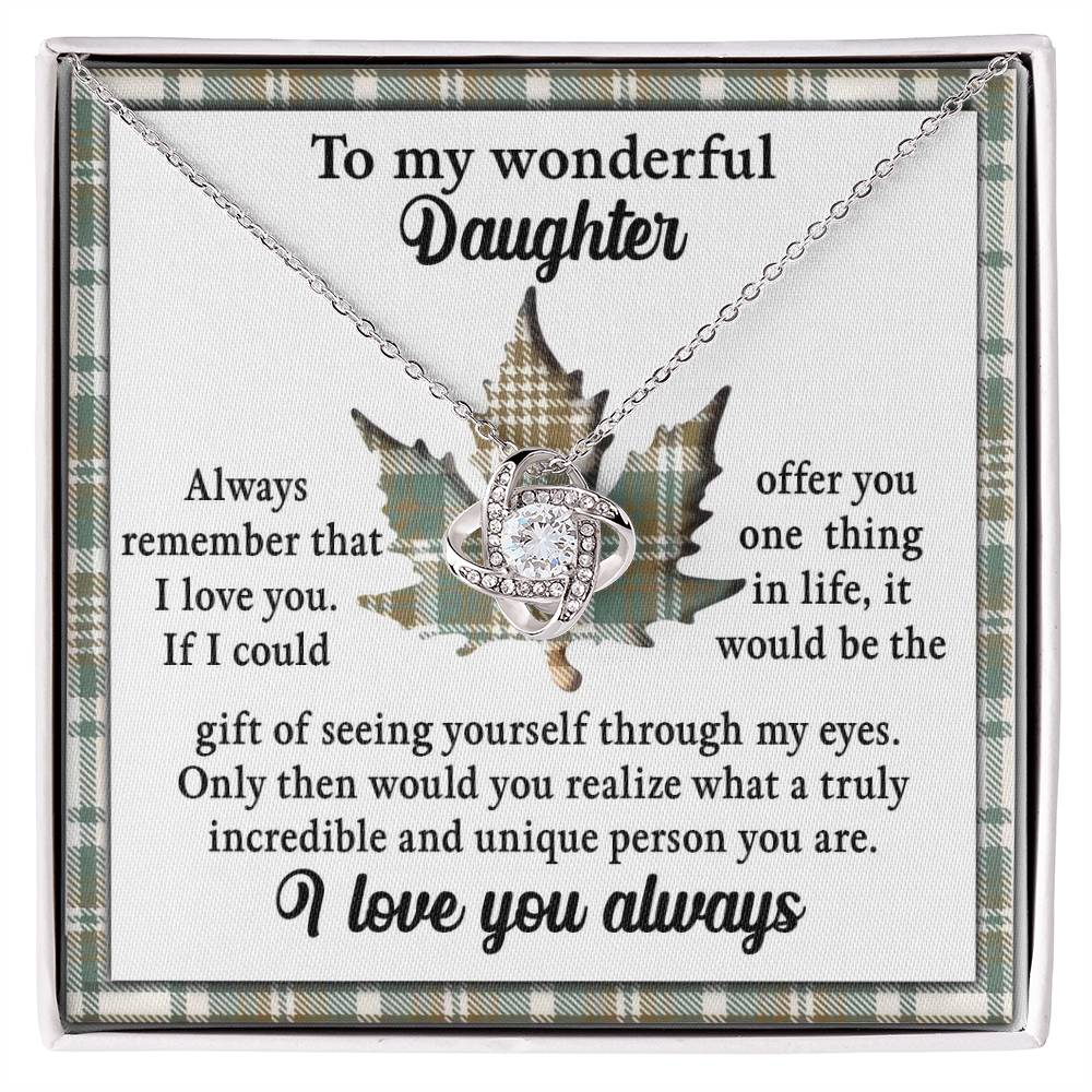 The Daughter-Through My Eyes - Love Knot Necklace, adorned with sparkling cubic zirconia crystals, is elegantly placed on a printed message that reads: "To my wonderful daughter, always remember that I love you. I love you always" along with additional heartfelt quotes. This personalized gift is perfect for expressing your enduring affection.