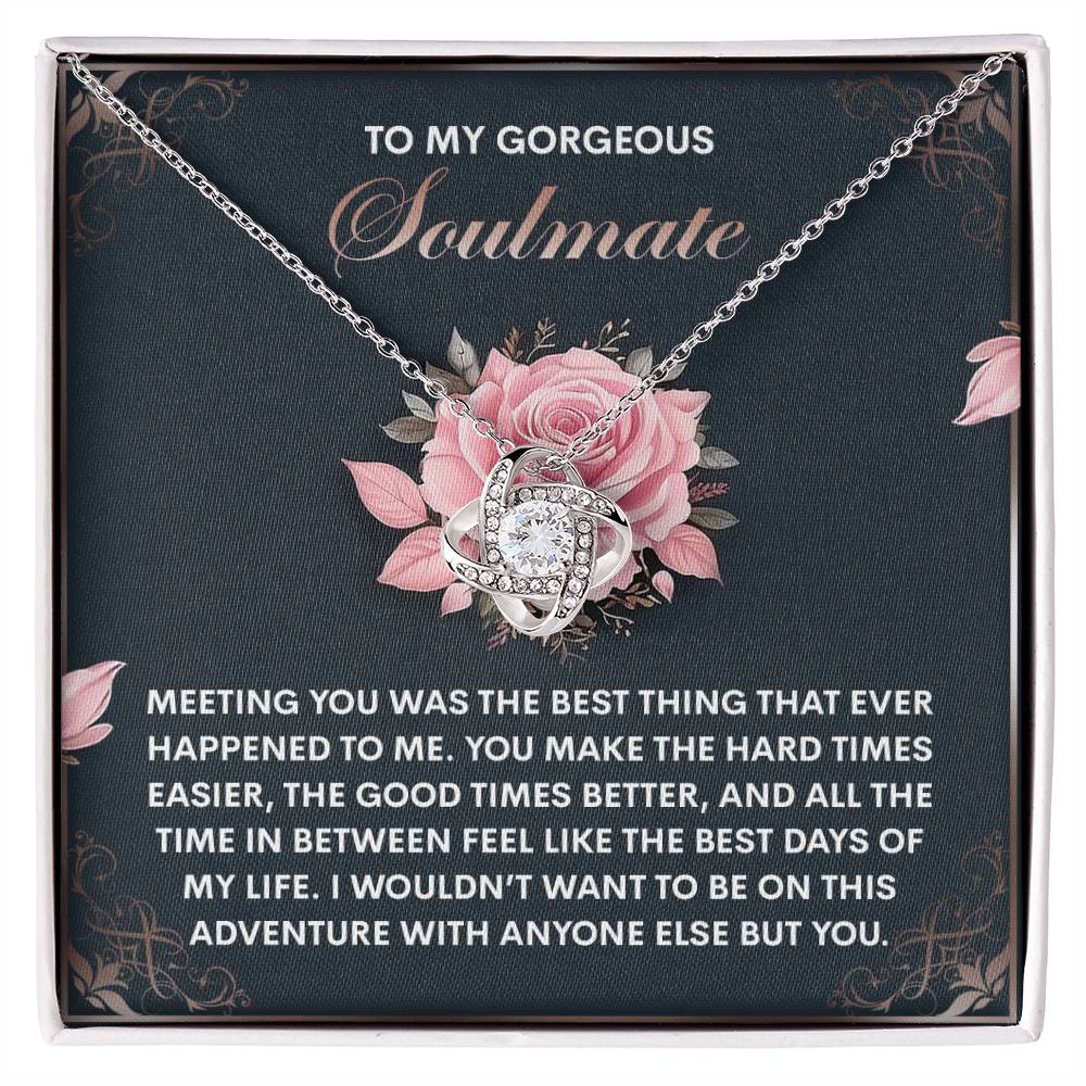The Soulmate-Best Days Love Knot Necklace features an intertwined heart design resting in a rose-adorned box. Accented with cubic zirconia crystals, the text on the box conveys gratitude and love for a soulmate, creating an ideal personalized gift.