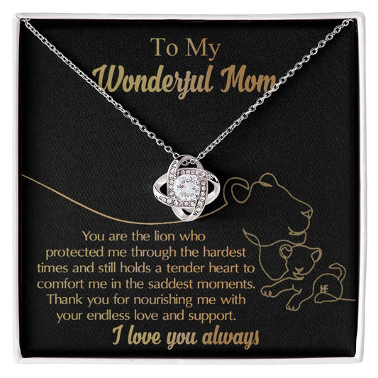 A To Mom, The Lion - Love Knot Necklace inside a box with an engraved message titled "to my wonderful mom," expressing love and gratitude, and featuring a gold finish.