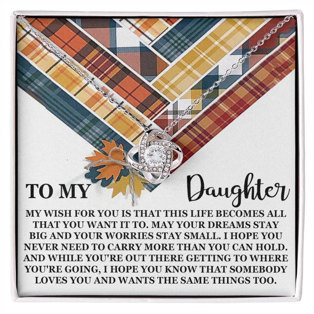 The "Daughter-The Same Things - Love Knot Necklace" gift box features a heart-shaped pendant on a message card that reads, "To My Daughter. My wish for you is that this life becomes all that you want it to," enhanced by sparkling cubic zirconia crystals.