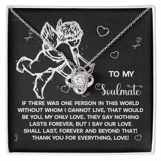 The Soulmate-Lasts Forever Love Knot Necklace showcases a delicate Celtic knot symbolizing an unbreakable bond, presented in a box with an angel illustration and the text expressing everlasting love, enhanced by sparkling cubic zirconia.