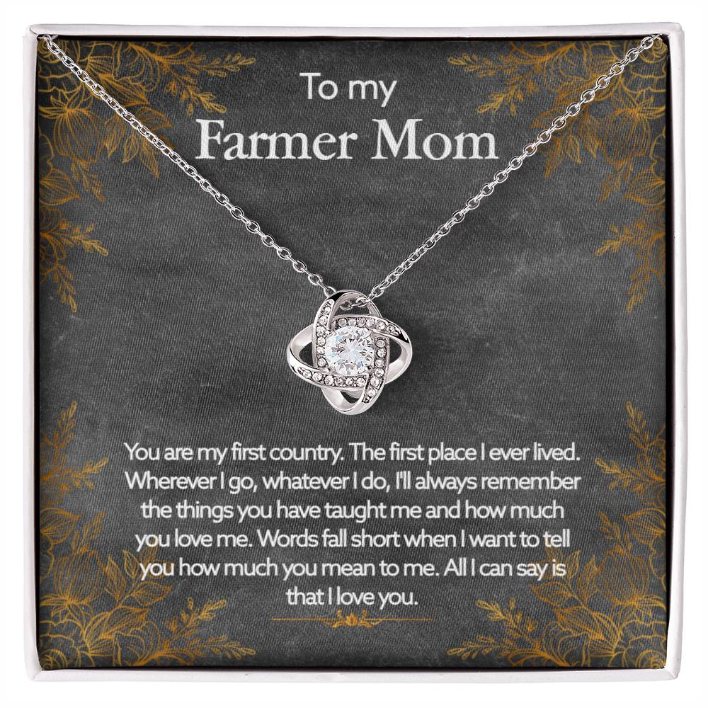 Silver heart-shaped To My Farmer Mom, You Are My First Country - Love Knot Necklace on a display card with a floral pattern and a sentimental message addressed to a "farmer mom."
Brand Name: ShineOn Fulfillment