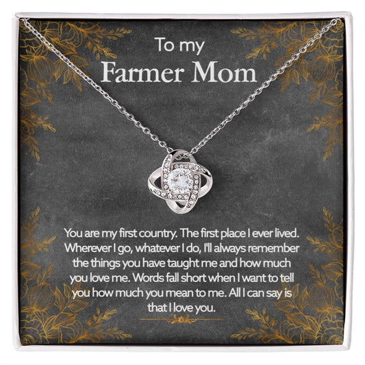 Silver heart-shaped To My Farmer Mom, You Are My First Country - Love Knot Necklace on a display card with a floral pattern and a sentimental message addressed to a "farmer mom."
Brand Name: ShineOn Fulfillment