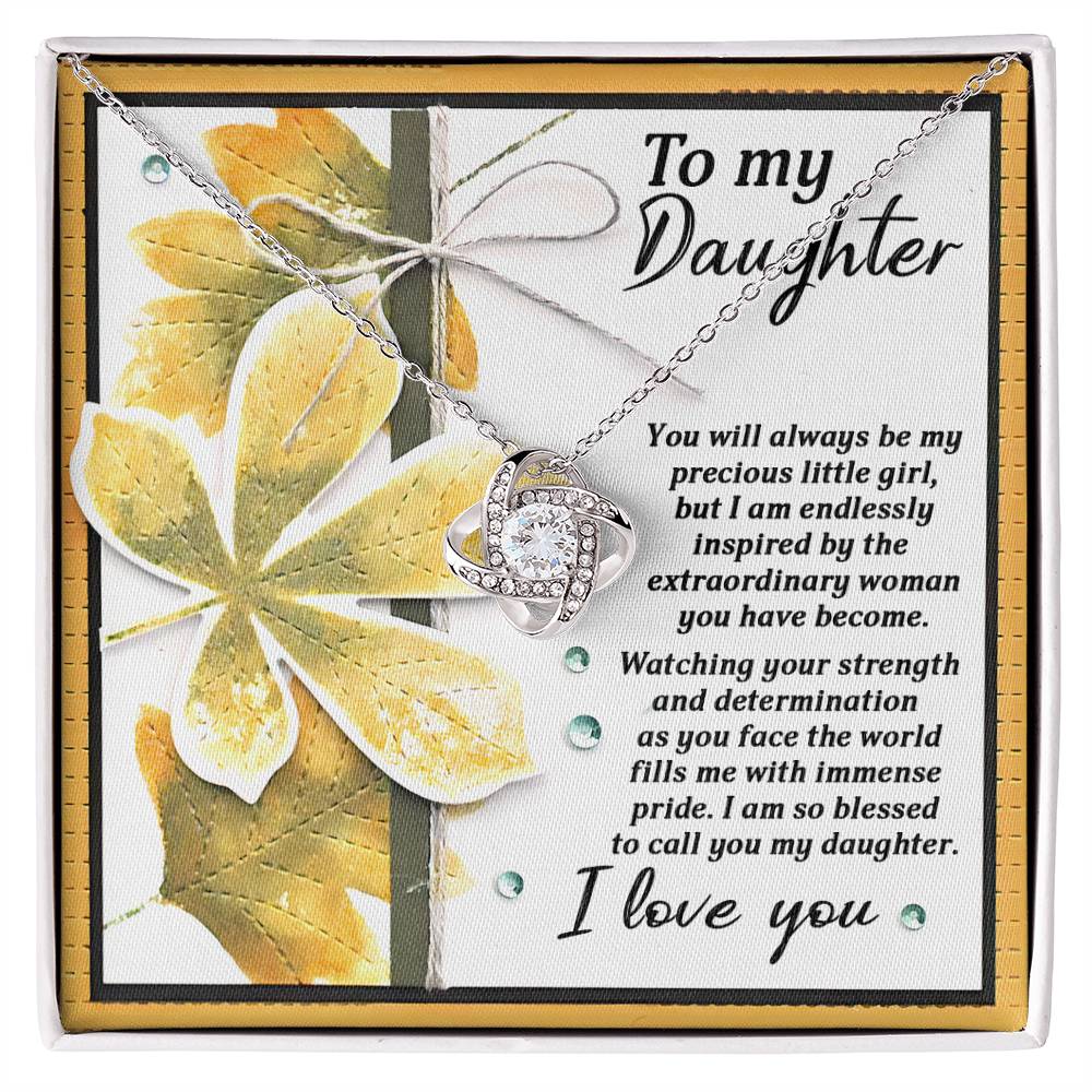 The Daughter-Blessed To Call - Love Knot Necklace, featuring a premium cubic zirconia, is presented with a heartfelt note that reads: "To my Daughter, You will always be my precious little girl, but I am endlessly inspired by the extraordinary woman you have become. I love you.