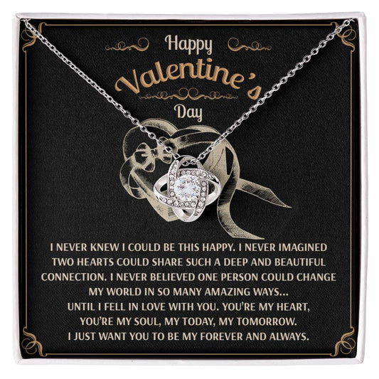 The Soulmate-Amazing Ways - Love Knot Necklace, featuring intertwined rings with sparkling cubic zirconia, is presented on a black card that reads "Happy Valentine's Day" with a romantic message. It's the perfect personalized gift to express timeless love and affection.
