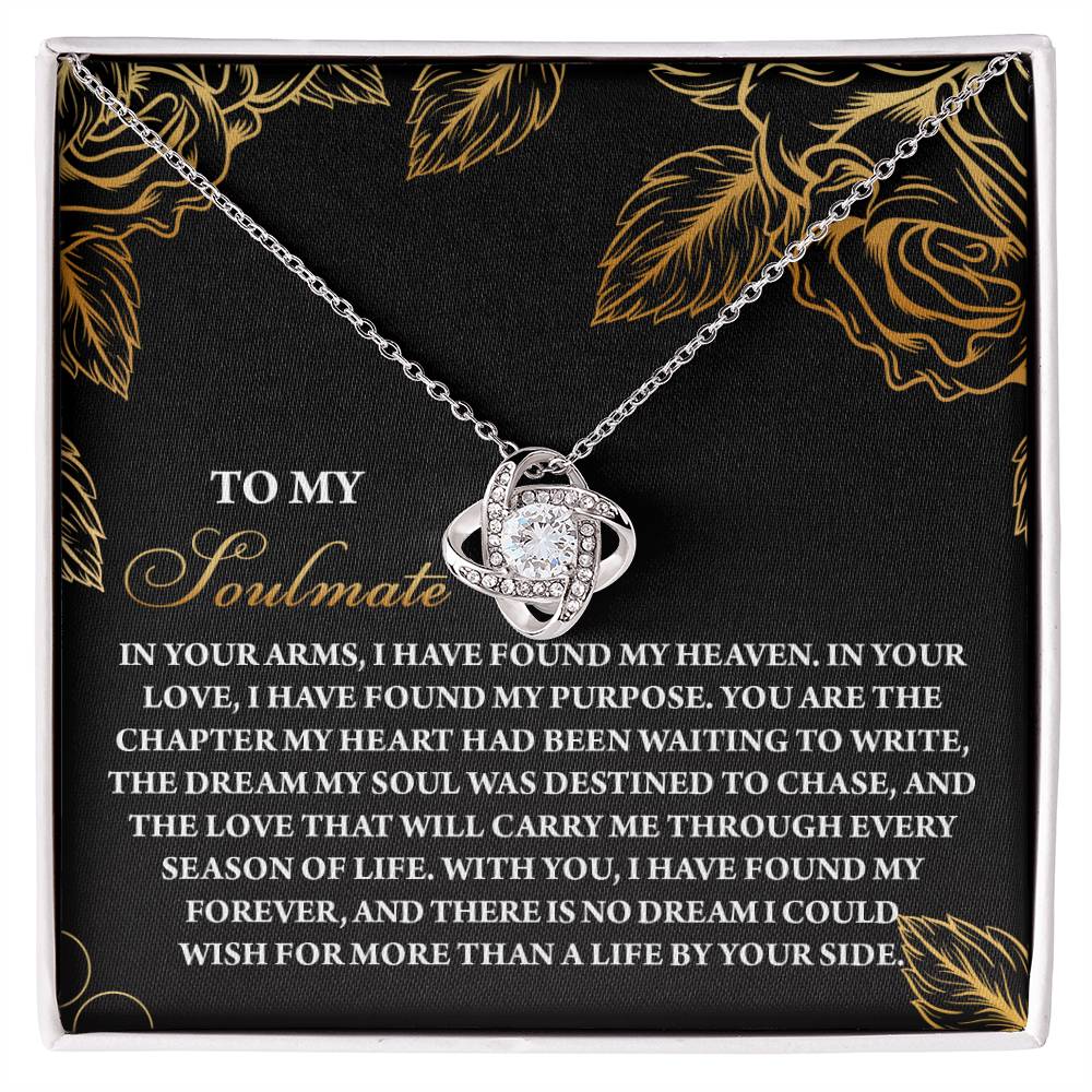 The Soulmate-By Your Side - Love Knot Necklace boasts an interlocking pendant with cubic zirconia crystals, beautifully packaged in a floral-designed box accompanied by a heartfelt message, making it the perfect classic gift for your soulmate.