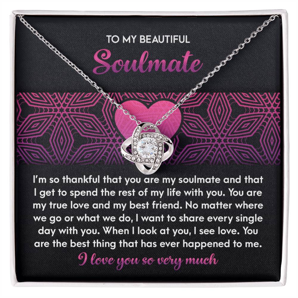 The Soulmate-I See Love - Love Knot Necklace, adorned with sparkling cubic zirconia crystals, comes on a card expressing love and gratitude to your soulmate. Its intertwined design symbolizes an unbreakable bond.