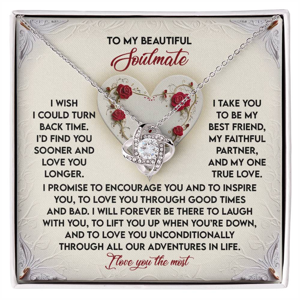 Soulmate-Laugh With You - Love Knot Necklace" showcases a heart-shaped pendant, complete with shimmering Cubic Zirconia Crystals on a card bearing a heartfelt message for your soulmate, symbolizing love, support, and commitment.
