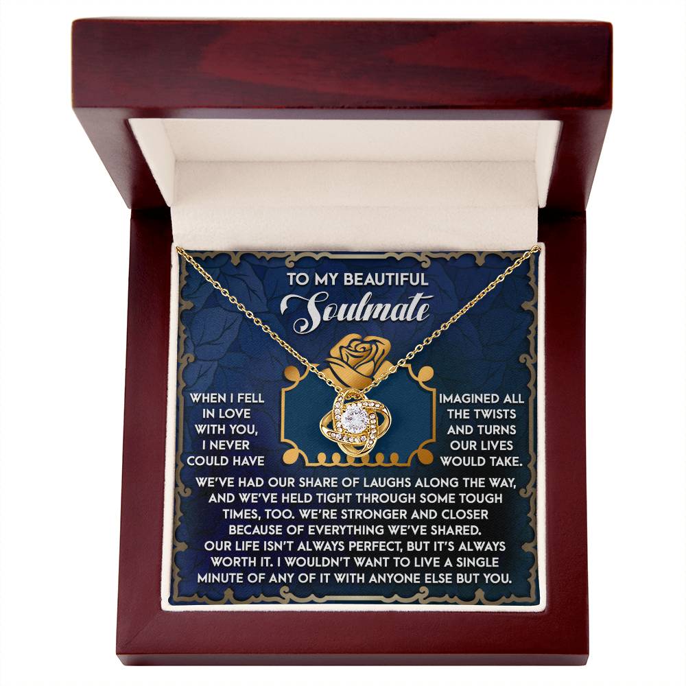 The Soulmate-The Way Love Knot Necklace, featuring a circular pendant with sparkling cubic zirconia crystals, is elegantly presented in a box. The inside lid text expresses love and appreciation, making it an ideal personalized gift for a soulmate.