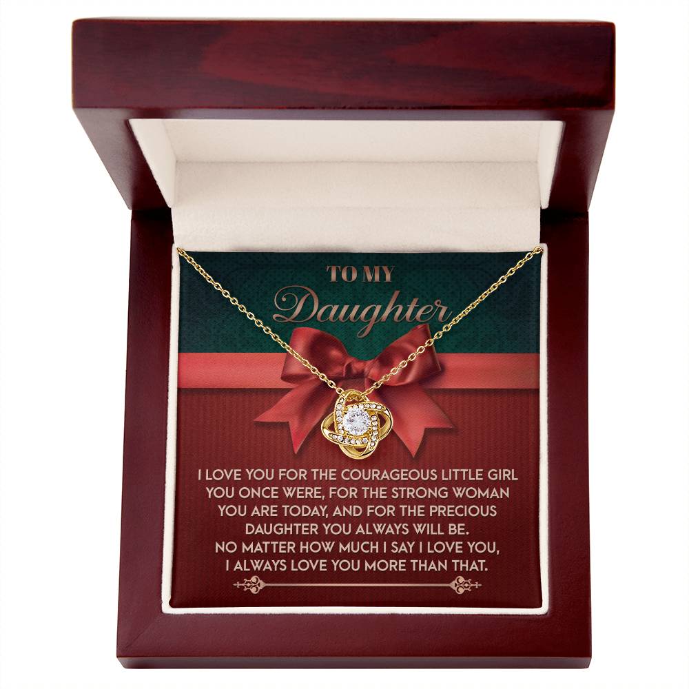The Daughter-Always Will Be - Love Knot Necklace, embellished with shimmering cubic zirconia crystals and offered in either a white gold or yellow gold finish, is beautifully displayed in an open box. Inside, a touching message honors the special connection between a parent and daughter, highlighting love and admiration.