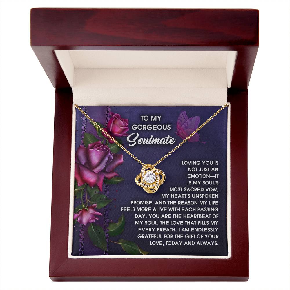 The Soulmate-Unspoken Promise - Love Knot Necklace, crafted from 14k white gold and cubic zirconia crystals, symbolizes an unbreakable bond. It's nestled in a wooden box with a flower-adorned message card and heartfelt note for your soulmate.