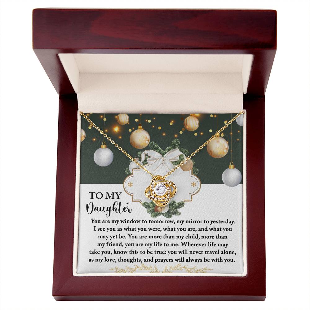 The Daughter-My Mirror - Love Knot Necklace, embellished with radiant cubic zirconia crystals, shines in an open box. Featuring a touching message card titled "To My Daughter," this elegant accessory serves as the ideal personalized gift.