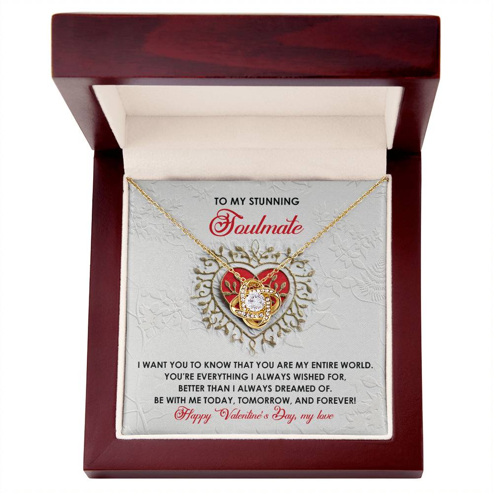 The Soulmate-Be With Me - Love Knot Necklace, featuring cubic zirconia crystals and a heart design, is elegantly displayed in an open jewelry box. It includes a heartfelt message: "To My Stunning Soulmate," making it a perfect personalized Valentine's Day gift.